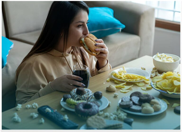 Visual depiction of binge eating disorder in a common domestic setting.